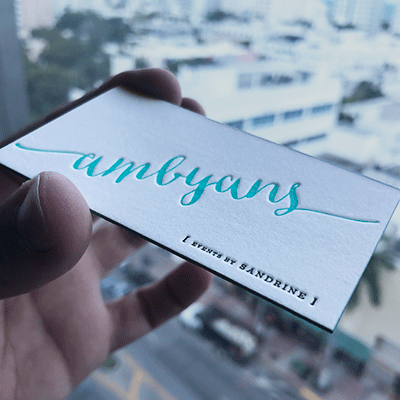 45pt cotton business cards with debossing and painted edges